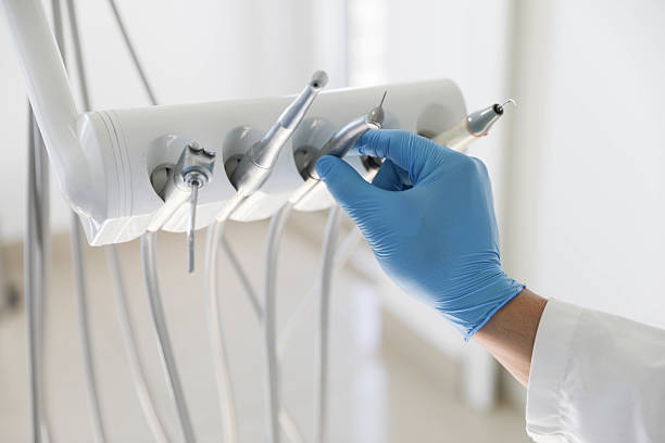 Professional Tooth Extraction technician working in Andale, KS